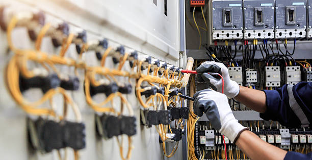 Professional Electrician technician working in Monroe, IA